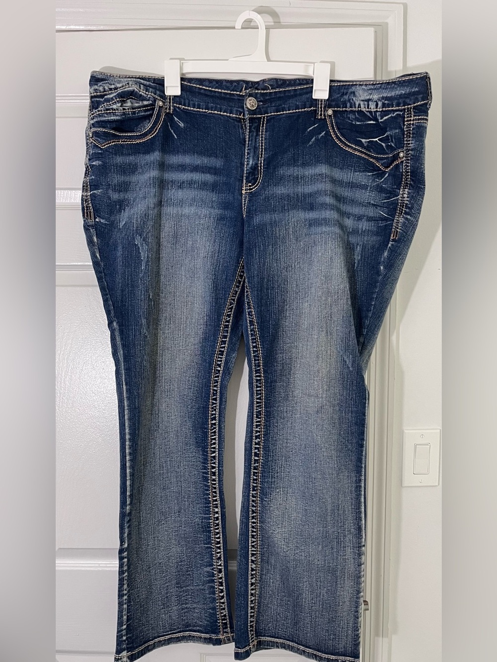 Ariya Women’s Dark Wash Bootcut Jeans Blue with whiskering contrast stitching